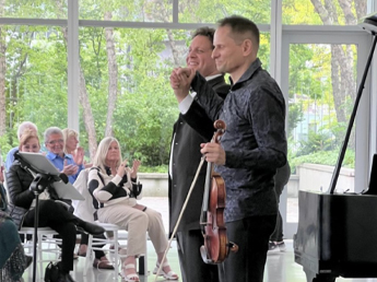 Michael Shulte & Daniel Vnukkowski in front of audience